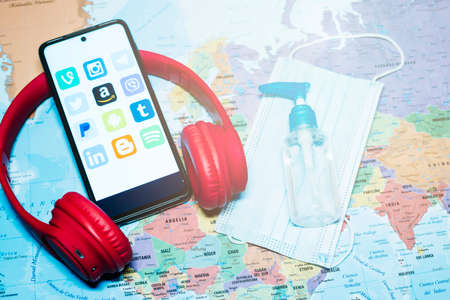Madrid, Spain 10/2020 mobile phone with the main social media with a world map backgroundのeditorial素材
