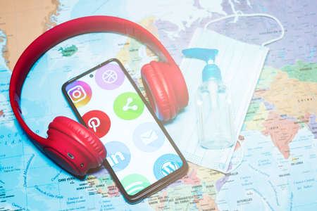 Madrid, Spain 10/2020 mobile phone with the main social media with a world map backgroundのeditorial素材