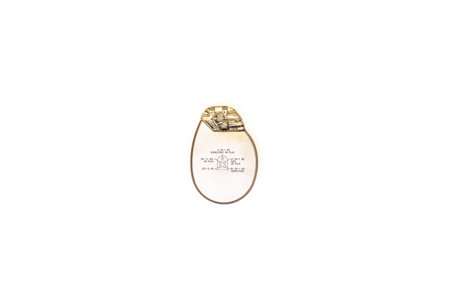 Implantable cardioverter defibrillator on white background, pacemaker battery.