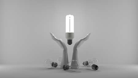 Hands protecting an idea. I have an idea and I want to protect it. Patenting an idea. Eureka, I have an idea. Light bulb symbol related to an idea.の写真素材