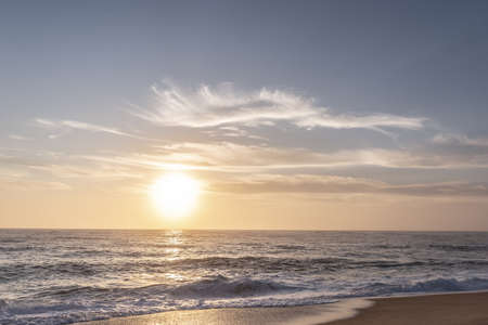 Sunset on the beach of northern portugal, Nazareの写真素材