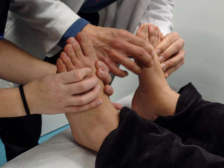Podiatry and biomechanics class. Teacher teaches students the different techniquesの写真素材