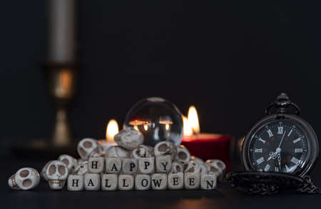 Mountains of pumpkins to celebrate halloween night with the happy halloween sign.の写真素材