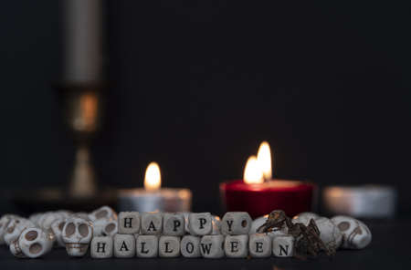 Mountains of pumpkins to celebrate halloween night with the happy halloween sign.の写真素材