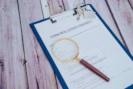 Form for the purchase and sale of real estate. Sample of the signature of the contract for the purchase of property.の写真素材