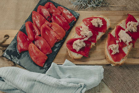 Spanish tapa of escalibada with peppers and tuna.の写真素材