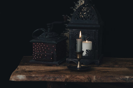 Dark wallpaper romantic scene of books, candles and mystery.の写真素材