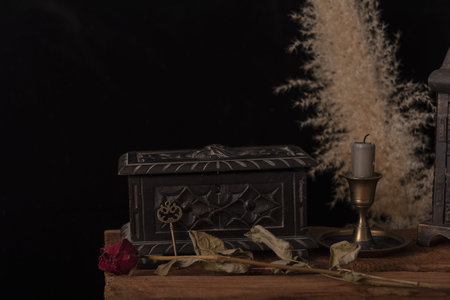 Dark wallpaper romantic scene of books, candles and mystery.