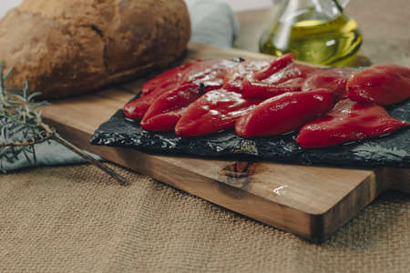 Tapas on Crusty Bread - Selection of Spanish tapas served on a sliced baguette.の写真素材