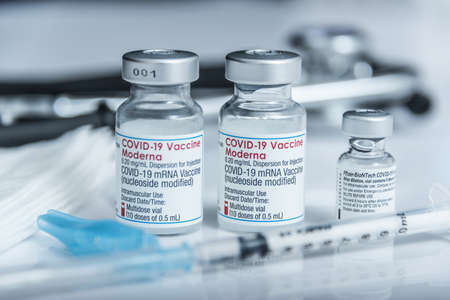 Madrid, Spain -10 December 2021: Approval of third COVID19 booster dose of Pfizer-Biontech and MODERNA vaccines for increased protection against OMICRON variant.のeditorial素材