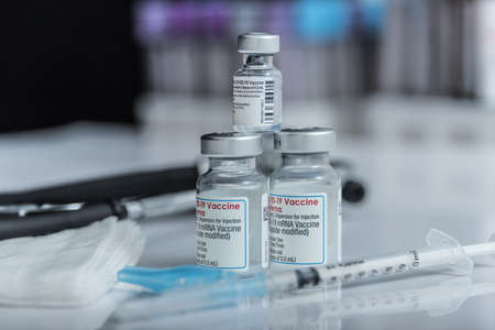 Madrid, Spain -10 December 2021: Approval of the third booster dose of coronavirus vaccines to increase protection against the OMICRON variant.のeditorial素材