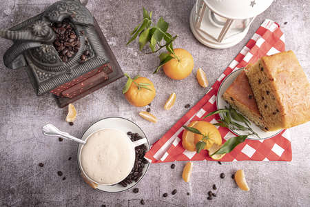 Concept of tasty breakfast with mandarin jam on white textured table.の写真素材