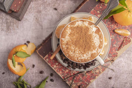 Concept of tasty breakfast with mandarin jam on white textured table.の写真素材