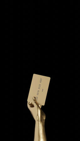 Female hand holding blank plastic credit card or business card on black isolated studio background. Banking services and acquaintance concept, copy space, cutout, low key. 3d rendering.の写真素材