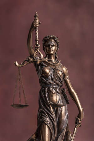 Law and judgment concept. Figure of Lady Justice in notary office close-upの写真素材