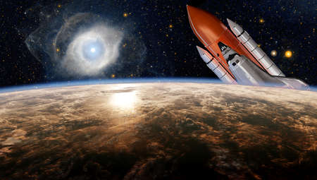 Space shuttle on orbit of the Earth planet. Spaceship.の写真素材