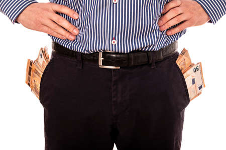Hand with hundred euros and young men with money in the pocket.の写真素材