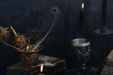 Satanic chalice for black mass preparation. dark background wallpaper.の写真素材