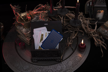 Witch laboratory with potion, elixirs, glass bottles, dry flowers, herbs and ingredients. Esoteric,...