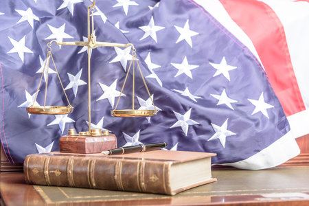 Family Law. Desktop photograph of law firm specialising in family law with the united states flag in...