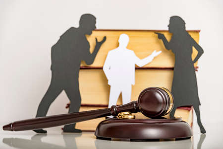 Silhouette symbol. Child custody. Family law proceedings. Divorce mediation, legal separation.の写真素材