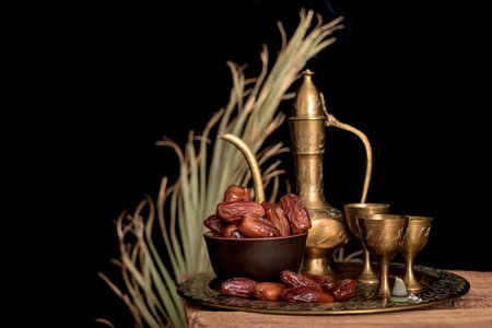 Ramadan Kareem and iftar muslim food, holiday concept. Trays with nuts and dried fruits and latterns...