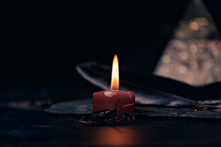 magic potions in witchs house with burning candles at night.の写真素材