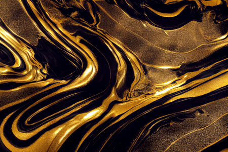 Close-up of gold and black acrylic paint ideal for textures and wallpapers.の写真素材