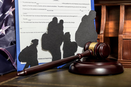 Immigration Removal Order. Silhouettes of people illegally crossing the border.の写真素材