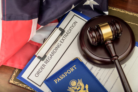 American passports and judges legal hammer on wooden desk.の写真素材