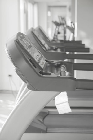 running machine in gym with display