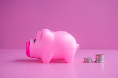 Piggy bank with pink background.の写真素材