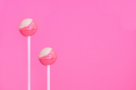 Lollipop placed on a pink background.の写真素材