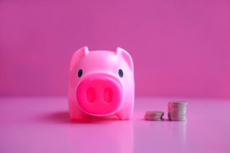 Piggy bank with pink background.の写真素材
