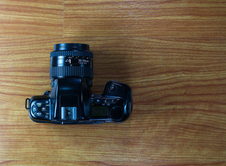 Old camera on  wood background