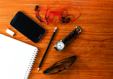Outfit of traveler on  wood background, Travel conceptの写真素材