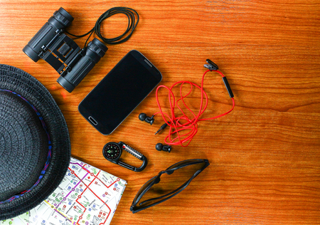 Outfit of traveler on  wood background, Travel conceptの写真素材
