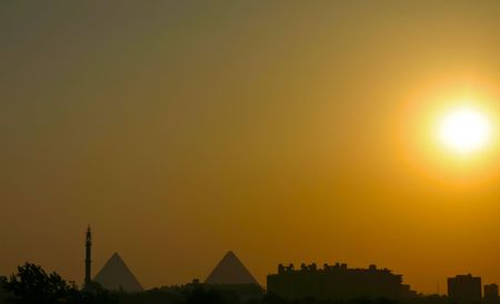 Sunset over gizah pyramids - Cairoの写真素材