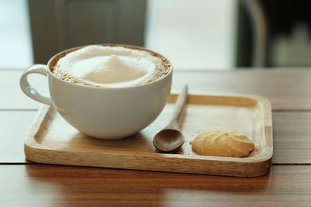 cup of coffee and cookieの写真素材