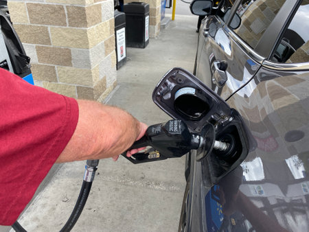 Orlando,FL/USA -10/27/19: A man pumping gas at a Sams Club gas stationのeditorial素材