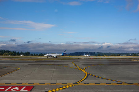 Seattle, WA/USA-9/16/19:An Alaska Airlines jet airplane ready to take off on the runway at the Seattle airport.のeditorial素材