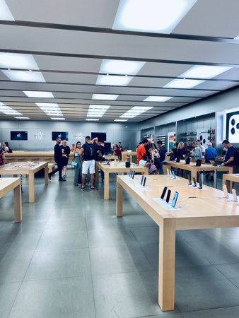 Orlando,FL/USA-9/30/19: An Apple store with people waiting to get in to purchase an Apple iPhone 11.のeditorial素材