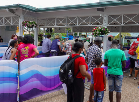 Orlando,FL/USA- 6/19/20:   People going through ticketing at Seaworld  in Orlando, Florida wearing...