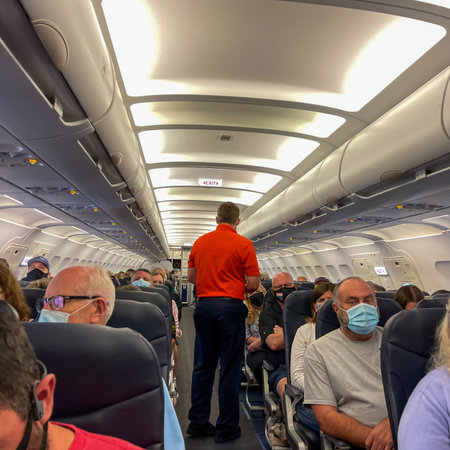Sanford, FL USA - May 13, 2021:   People waiting in an Allegiant airplane at the Sanford International Airport in Sanford, Florida getting ready for take off.のeditorial素材