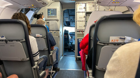 Sanford, FL USA - May 13, 2021:   People waiting in an Allegiant airplane at the Sanford International Airport in Sanford, Florida getting ready for take off.のeditorial素材