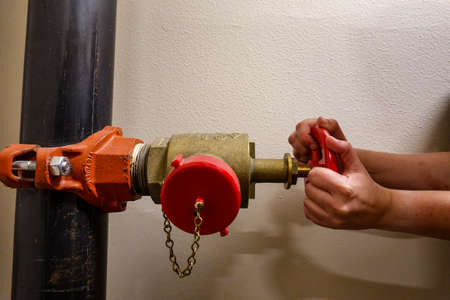 Seattle, WA USA - September 6, 2019:  A water shutoff valve in an apartment complex in Seattle, WA.の写真素材