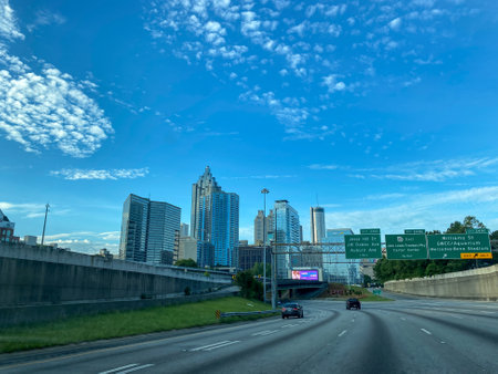 Atlanta, GA USA - May 25, 2021:  The Atlanta, Georgia skyline with road signs, condominiums and office buildings.のeditorial素材
