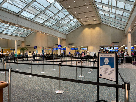 Orlando, FL USA - September 23, 2021:  People walking through the security line at Orlando...