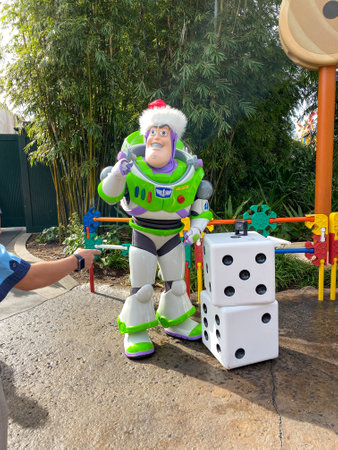 Orlando, FL USA-November 27, 2019:  Buzzlightyear from the movie Toy Story possing for a photo in Hollywood Studios in Orlando, Florida.のeditorial素材