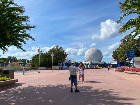 Orlando, FL USA-  August 3, 2020: People walking around EPCOT  in Walt Disney World in Orlando, Florida.のeditorial素材